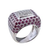 A French ruby and diamond dress ring, the central rectangular panel set with brilliant cut diamonds,