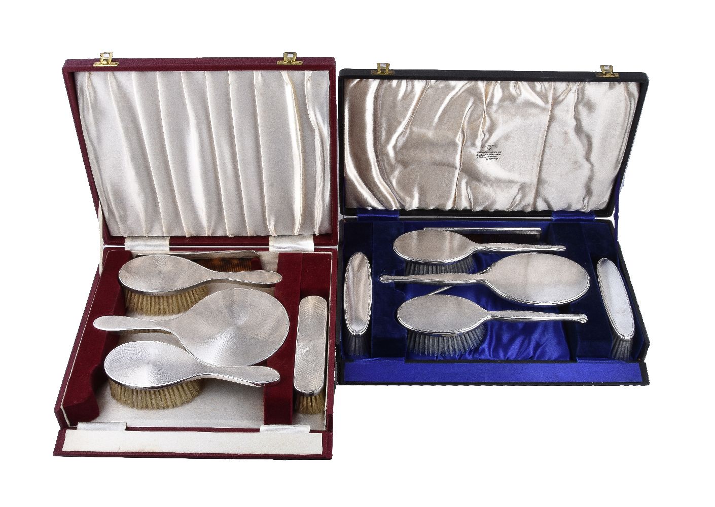 ϒ A cased matched silver mounted dressing table set