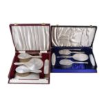 ϒ A cased matched silver mounted dressing table set