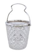 A silver mounted cut glass ice pail by John Round & Son Ltd, Sheffield 1910, with a shaped swing