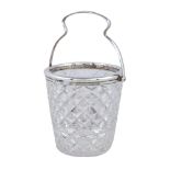 A silver mounted cut glass ice pail by John Round & Son Ltd, Sheffield 1910, with a shaped swing