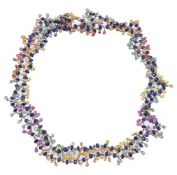 A gold and multi coloured sapphire necklace by Yvel, the gold links set with facetted sapphire beads