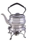 A silver oval baluster kettle on stand by Harrison Brothers & Howson, Sheffield 1922, with a