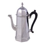 A silver octagonal tapered coffee pot by D & J Welby, London 1896, with an octagonal finial to the