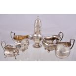 A collection of silver items, to include: a late Victorian castor by Harrison Brothers & Howson,