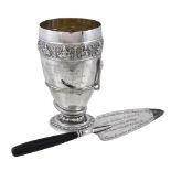 An Indian colonial silver presentation beaker, unmarked, Madras circa 1885, with a chased Swami