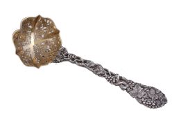 A fine Victorian silver parcel gilt pierced Vine pattern sifting spoon by Francis Higgins II, London