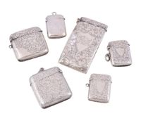 An Edwardian silver card case and five vesta cases, the card case by Marples & Co., Birmingham 1902,