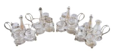 A set of four Victorian silver quatrefoil cruet frames by Heath & Middleton, London 1869, of wire