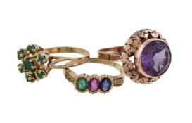 A sapphire, ruby and emerald ring, set with an oval cut sapphire, ruby and emerald, between