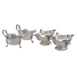 A pair of Edwardian silver shaped oval sauce boats by Thomas Bradbury & Sons, London 1902, with twin