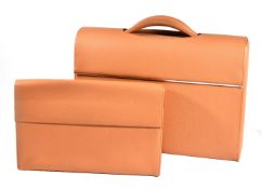 Connolly, a leather briefcase, the leather case opening to a padded interior, with a single handle