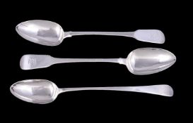 Three George III silver gravy spoons, comprising: a pair in fiddle pattern by William Esterbrook,