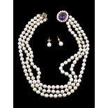 A cultured pearl and amethyst choker necklace, the three strands of uniform cultured pearls,