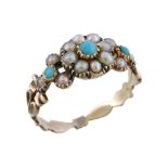 An early Victorian turquoise and seed pearl ring, circa 1840, the flower head cluster set with a