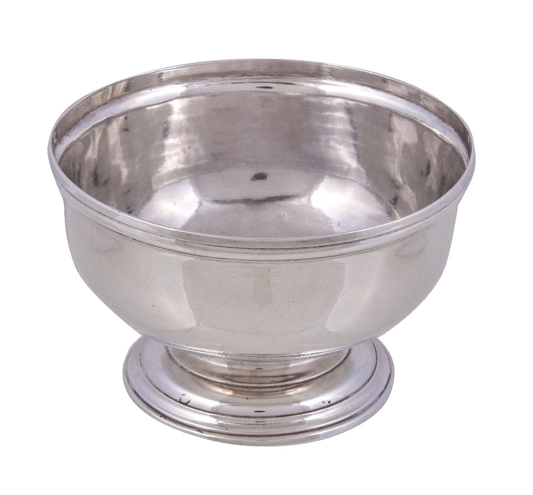 A George II silver circular sugar bowl, maker's mark over-struck by town mark, London 1740, the