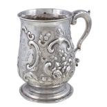 A George III baluster mug by James Stamp, London 1778, with a leaf capped double scroll handle,