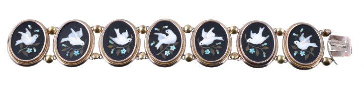 A late Victorian pietra dura bracelet, circa 1880, the oval panels inlaid with pietra dura to depict