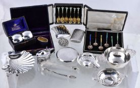 A collection of small silver, including: a set of six silver gilt, white and green enamel coffee