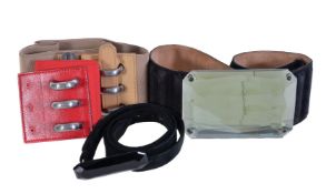 Four Fendi belts, to include: a red elasticated belt, with a white metal and black lacquered sliding