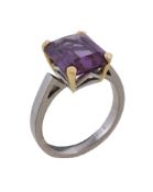 An 18 carat gold synthetic alexandrite ring, the rectangular cut synthetic alexandrite in a four