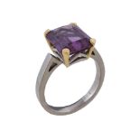 An 18 carat gold synthetic alexandrite ring, the rectangular cut synthetic alexandrite in a four