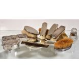 ϒ A collection of silver mounted dressing table items, to include: a four piece silver mounted