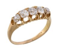 A Victorian five stone diamond ring, circa 1890, the five old cut diamonds in gold open claw