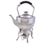 An Edwardian silver oval half fluted kettle on stand by William Hutton & Sons Ltd., Sheffield