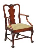 A George II walnut armchair, circa 1740, possibly Irish, the shaped back with vase splat