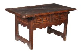 A Spanish walnut centre or side table, circa 1700, the rectangular top above a pair of mitre