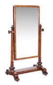 A William IV mahogany cheval mirror, circa 1835, the rectangular plate within a moulded frame,