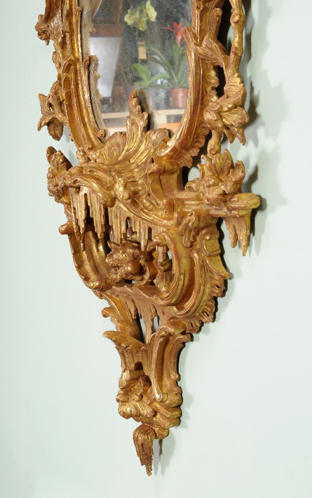 A carved giltwood and gesso wall mirror, late 18th/19th century, the central shaped plate within a - Image 3 of 4