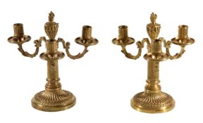 A pair of fine Louis XVI ormolu three light candelabra, late 18th century, the fluted cylindrical