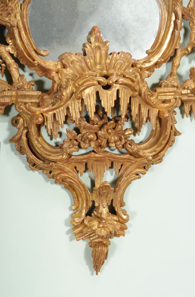 A carved giltwood and gesso wall mirror, late 18th/19th century, the central shaped plate within a - Image 2 of 4