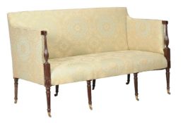 A mahogany and upholstered sofa, circa 1790 and later, the padded rectangular back and arms with