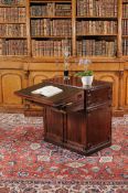 A Regency mahogany writing cabinet, in the manner of Gillows, circa 1815, decorated with roundel