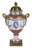 A Continental porcelain Sevres-style gilt-metal-mounted pot-pouri urn and gilt-metal pierced