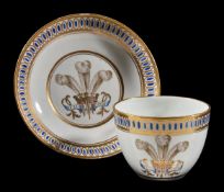 A Neale & Wilson 'Bute' shape teacup and saucer, circa 1790, painted in shades of blue, red, grey