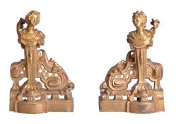 A pair of gilt bronze chenets in late Louis XV style, last quarter 19th century, each cast with