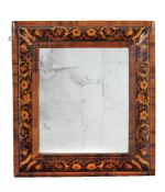 A William and Mary walnut and marquetry cushion framed wall mirror, circa 1690, the rectangular