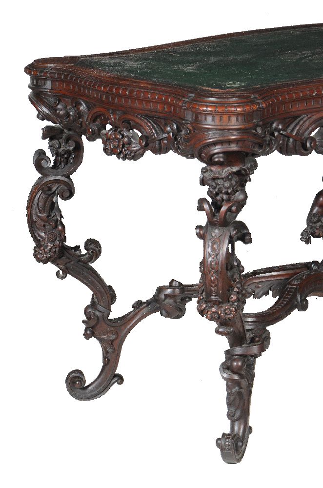 An Italian carved walnut library or centre table, circa 1870, the cartouche shaped top with - Image 6 of 9