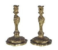 A pair of Louis XV ormolu candlesticks, in the manner of examples by the Slodtz brothers, circa
