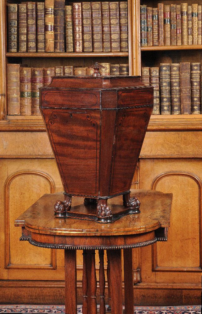 ϒ A Regency mahogany and ebony inlaid pedestal knife box, circa 1820