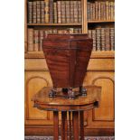 ϒ A Regency mahogany and ebony inlaid pedestal knife box, circa 1820