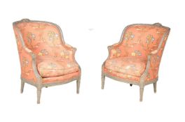 A pair of grey painted and upholstered tub armchairs, in Louis XVI style, second half 19th