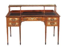 ϒ A Victorian rosewood and ivorine inlaid dressing table or desk, attributed to Collinson & Lock