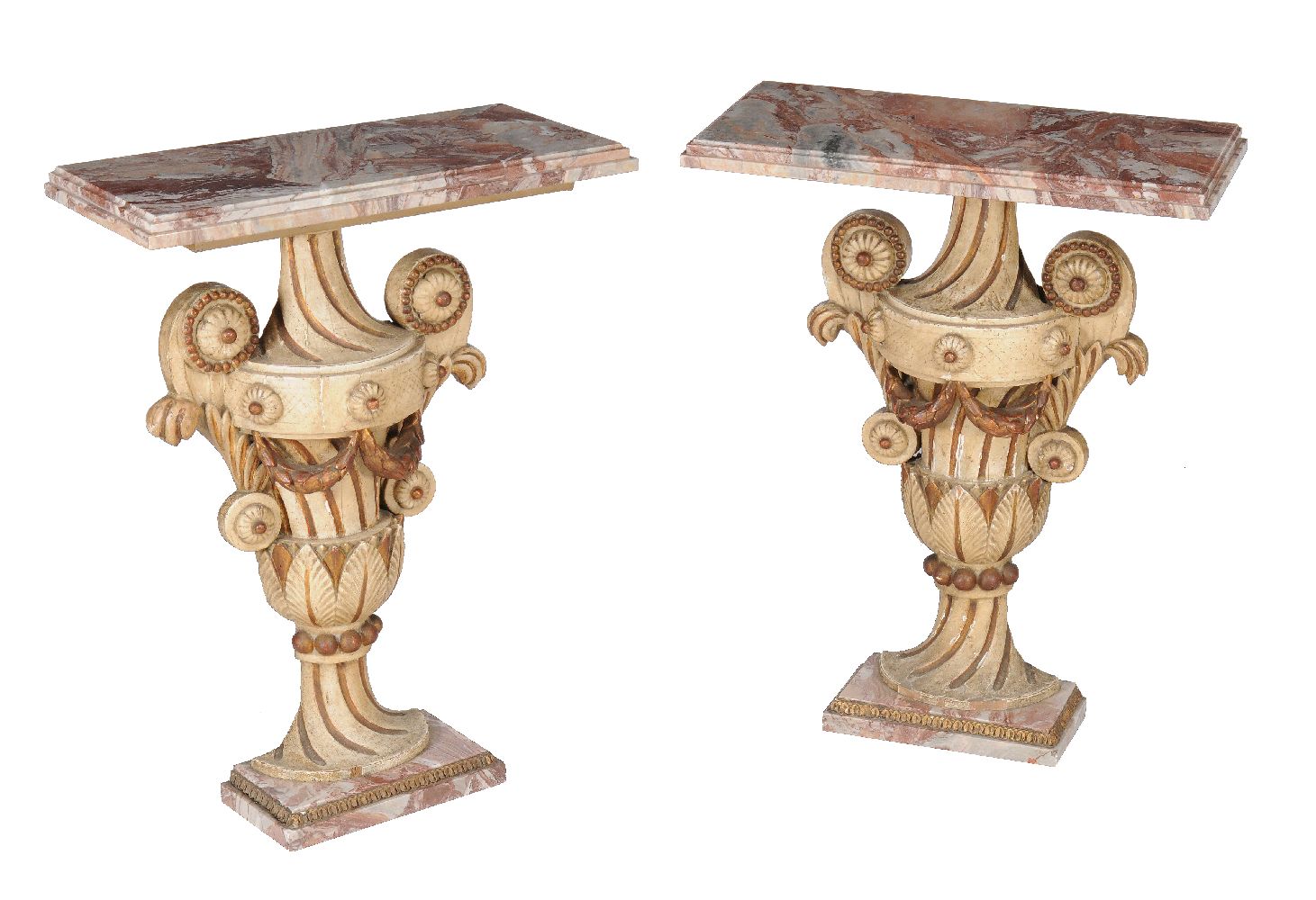 A pair of Continental carved giltwood and cream painted console tables, 19th century and later, with