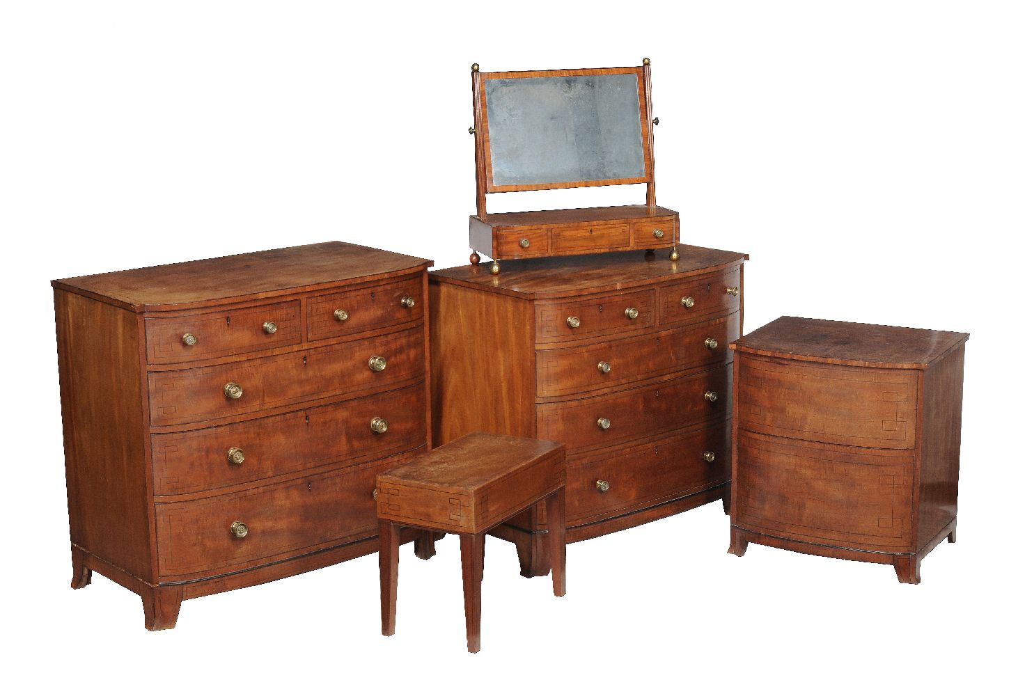 A Regency mahogany and inlaid suite of bedroom furniture, circa 1815, comprising; a companion pair