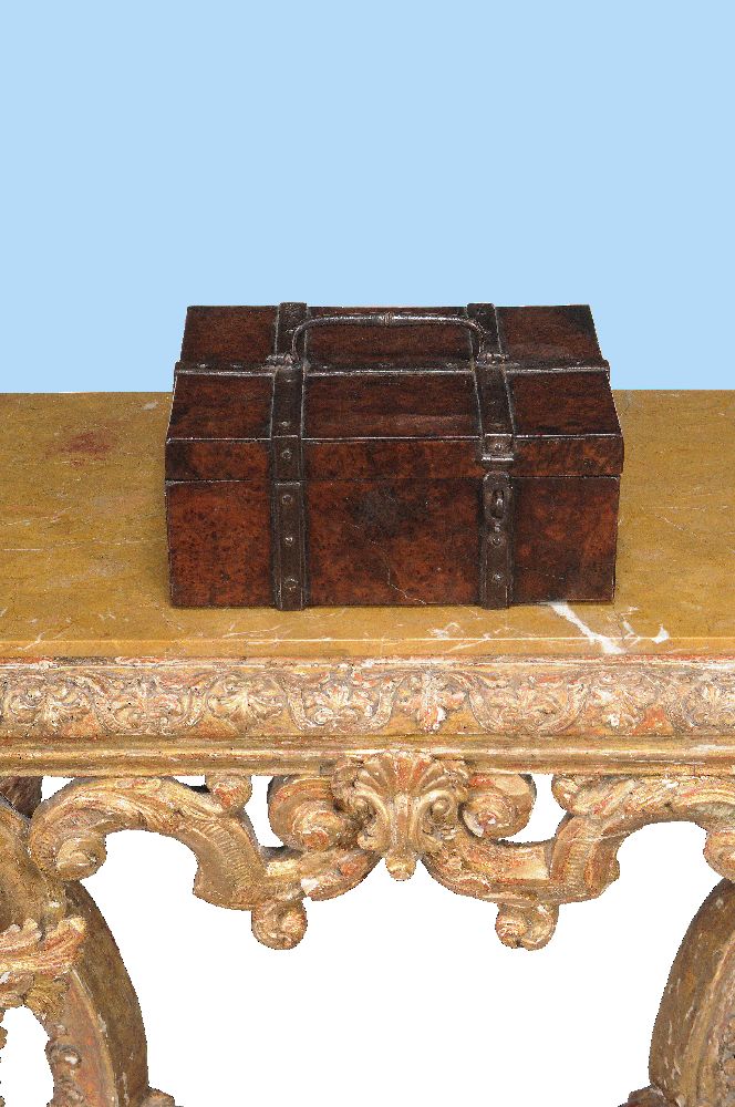 A William III burr yew and iron bound casket, circa 1695, the hinged lid with a central handle,